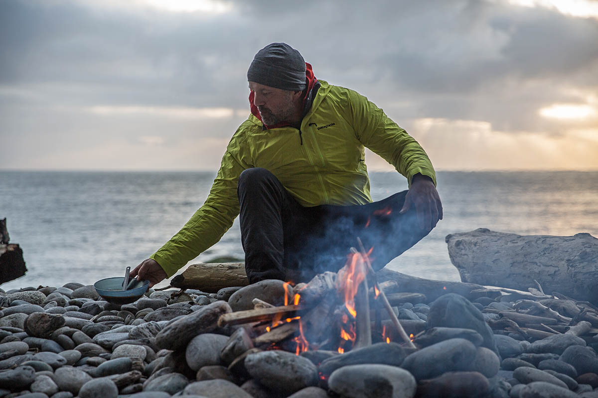 Patagonia Storm10 Alpine Jacket (sitting by fire on beach)